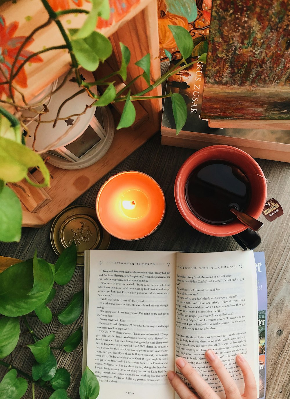 orange ceramic mug on brown wooden table