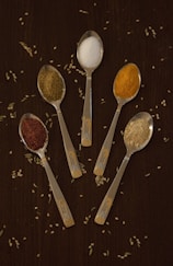 stainless steel spoons with herbs