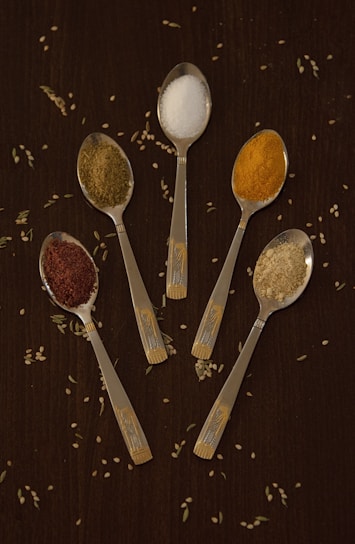 stainless steel spoons with brown powder