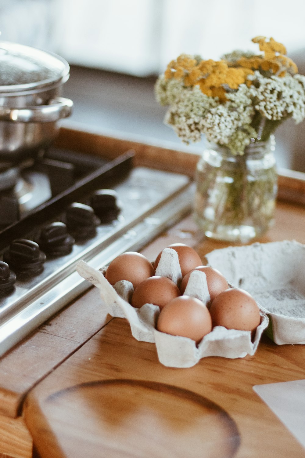 brown eggs on white tray