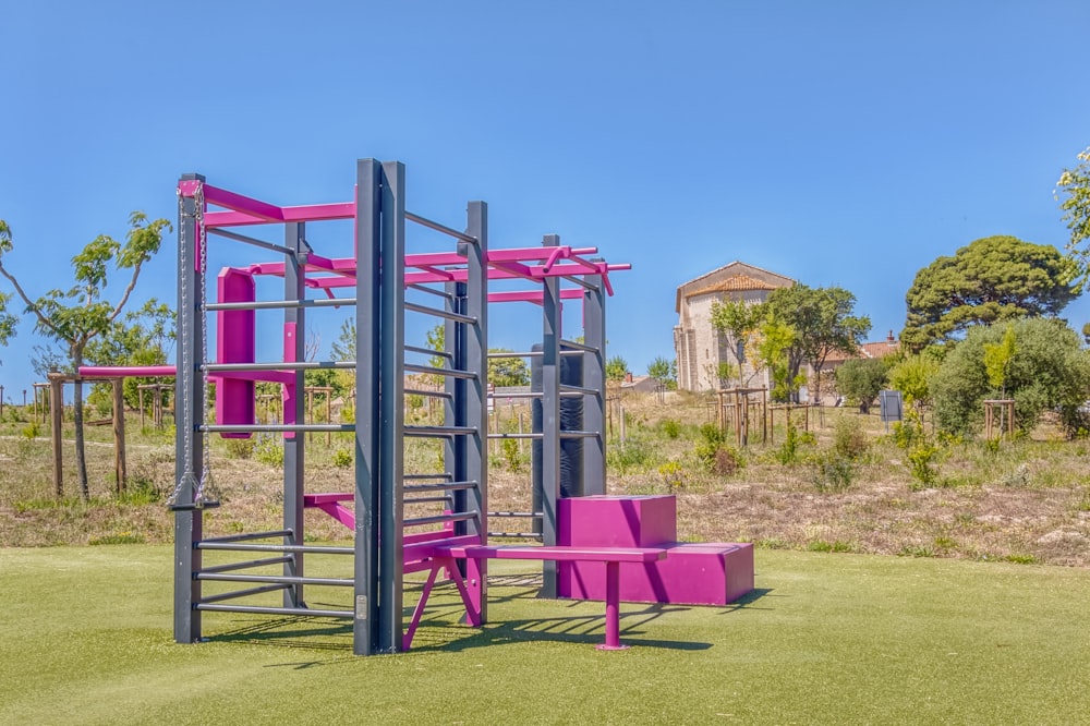 Parco giochi blu, rosa e verde