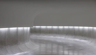 A serene living space designed for seniors with dementia, featuring calm lighting and safety features.