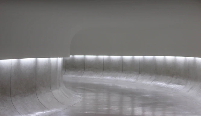 A serene, minimalistic workspace with soft glowing lights and a futuristic touch, evoking calm and openness.