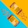 Two packages labeled 'Muddy Bites' filled with bite-sized waffle cones are placed on a background divided diagonally into blue and orange halves. The packages are yellow with brown accents, and each side has several scattered chocolate-filled waffle cones.