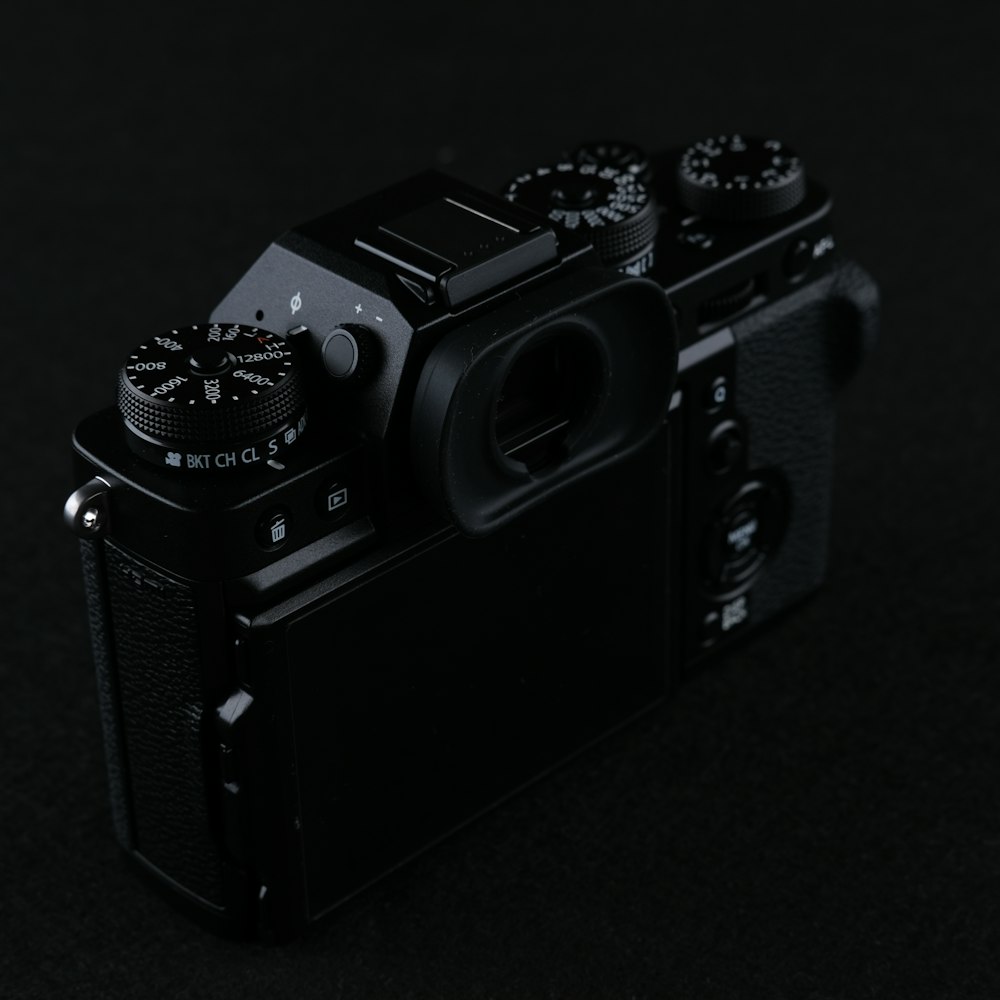 black and silver dslr camera