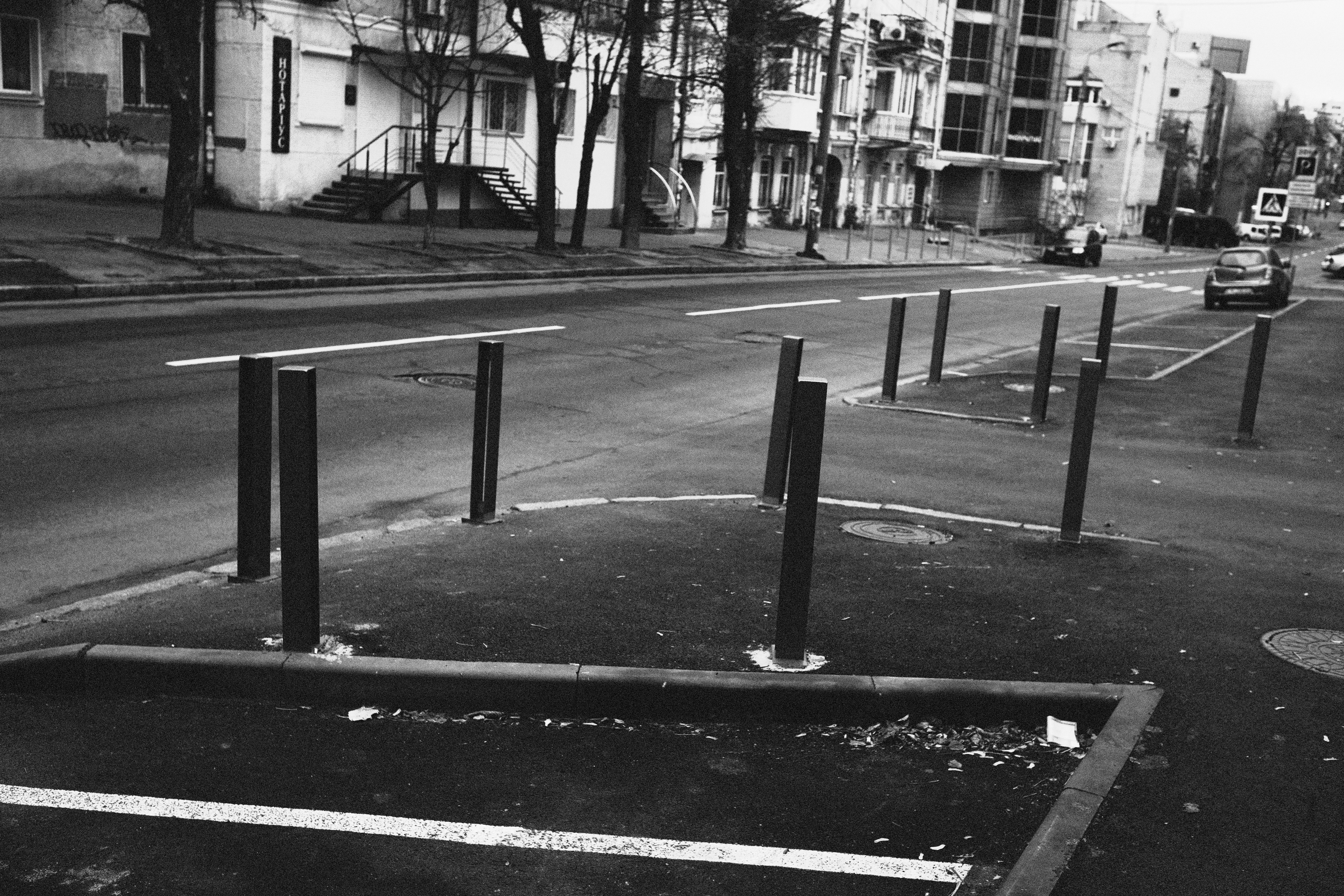 grayscale photo of street post