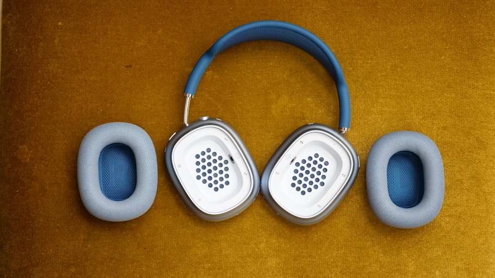 grey and white corded headphones
