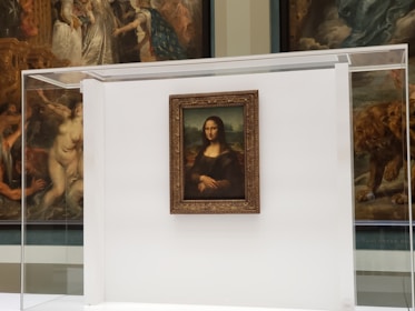 A panoramic view of the original documented painting displayed with archival certificates.