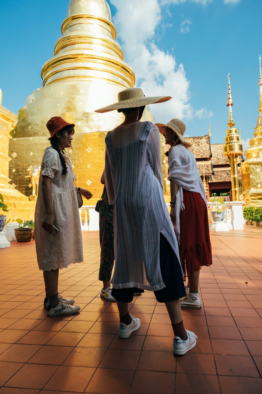 a group of people standing next to each other