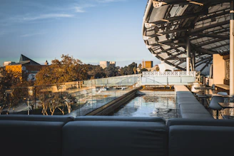 Outdoor terrace with sleek architectural elements blending nature and comfort.