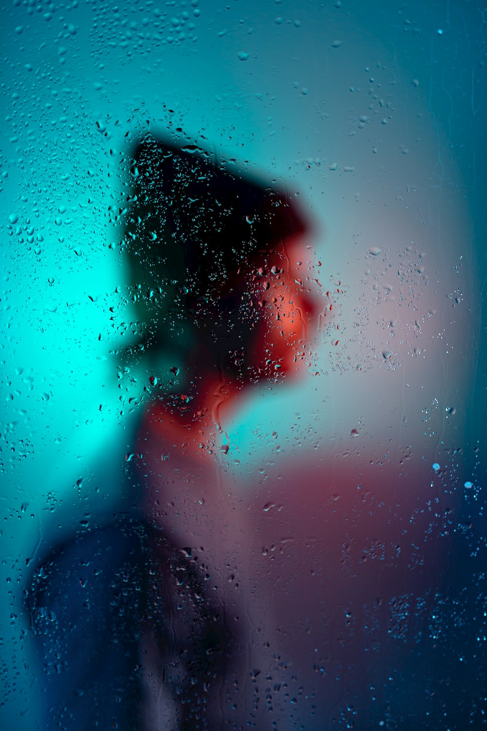 person in water with water droplets