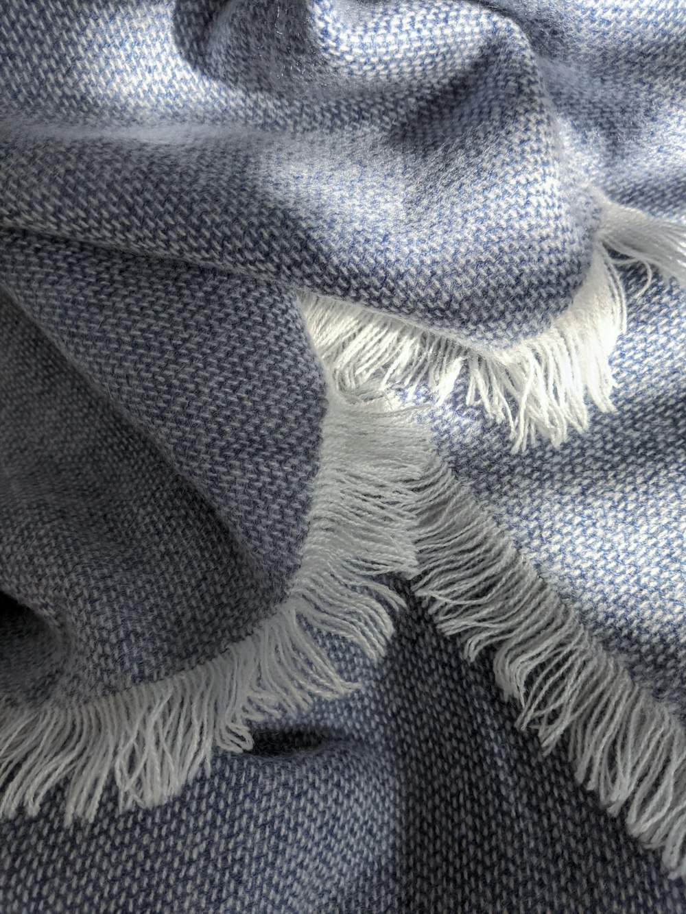 blue and white knit textile