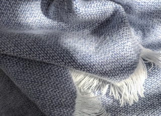blue and white knit textile
