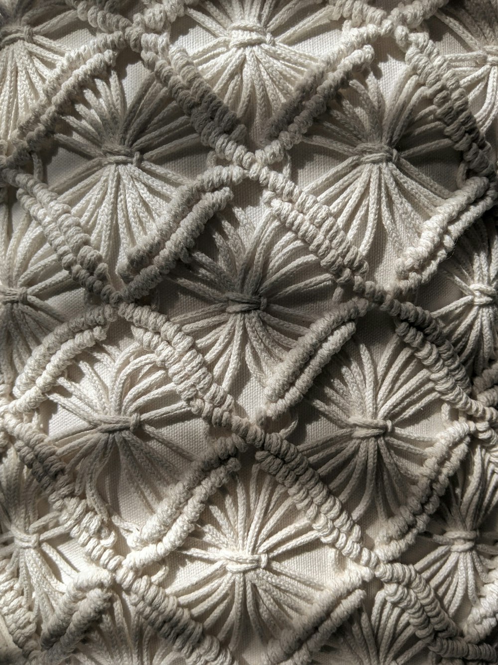 brown and white floral textile