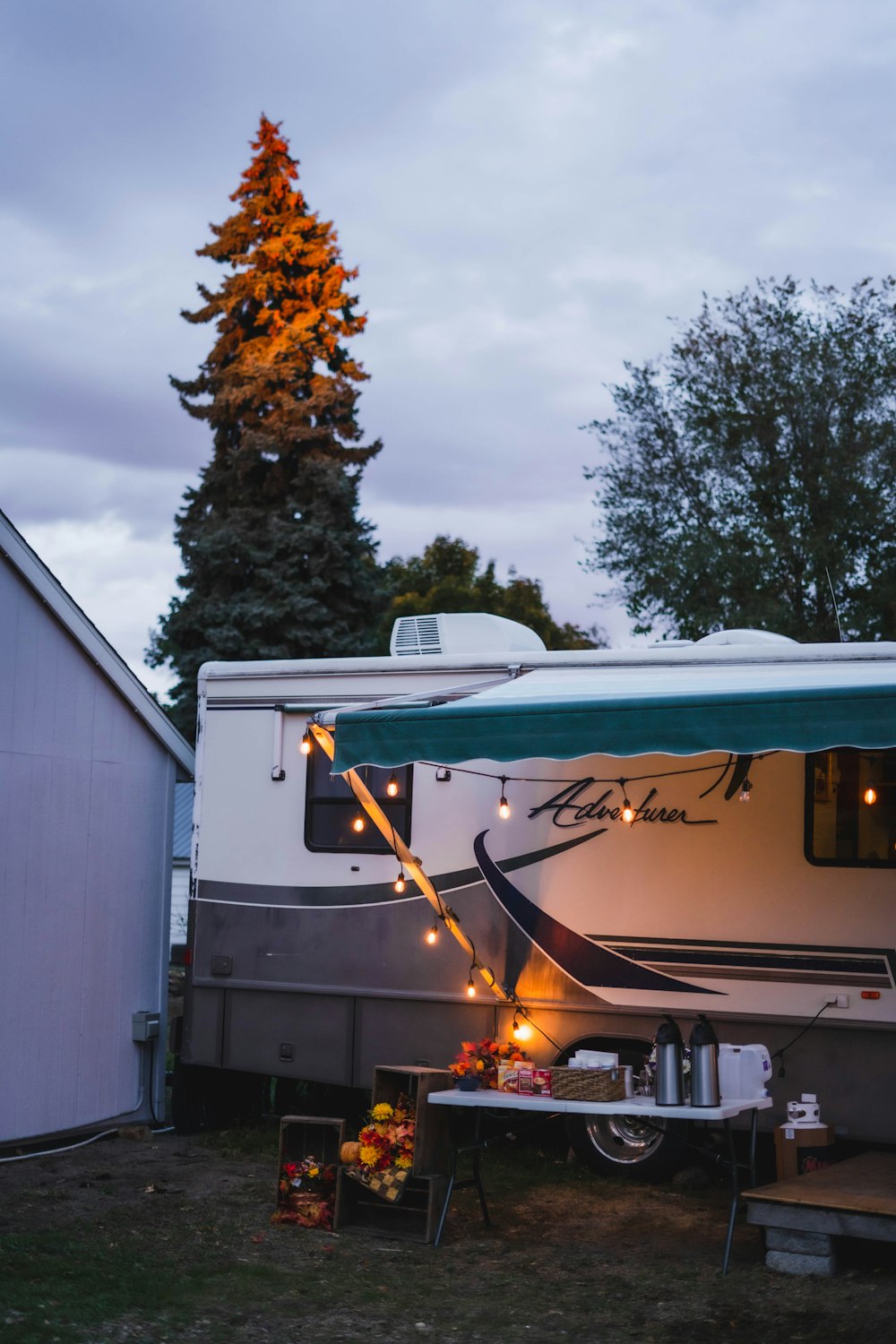 white and brown rv trailer