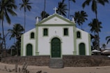 white and green concrete church