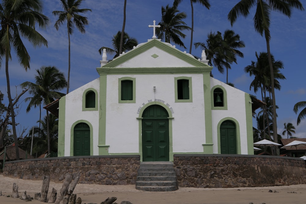 white and green concrete church