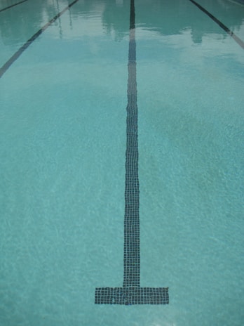 Visual of a swimming pool with overlay graphics illustrating movement tracking and data points.
