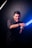 man in black crew neck t-shirt holding blue flashlight