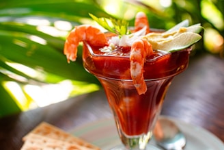 A colorful display of shrimp cocktails served in glasses.