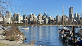 A scenic waterfront with tourists enjoying a sunny day, ideal for showcasing regional attractions.