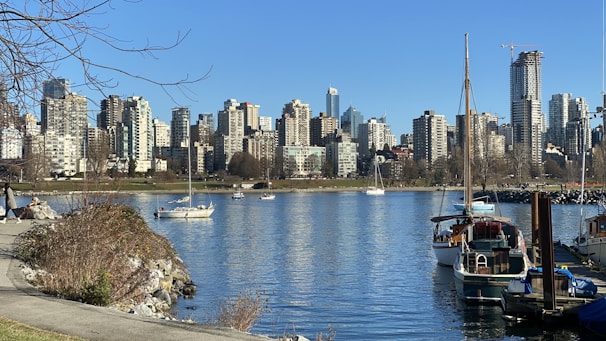 A scenic waterfront with tourists enjoying a sunny day, ideal for showcasing regional attractions.