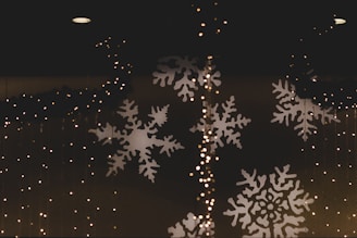 Festive digital tokens glowing with holiday lights and snowflakes.