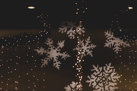 Festive digital tokens glowing with holiday lights and snowflakes.