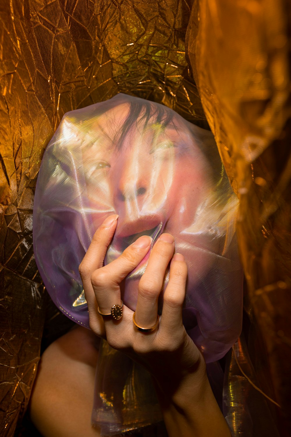 person covering face with white powder