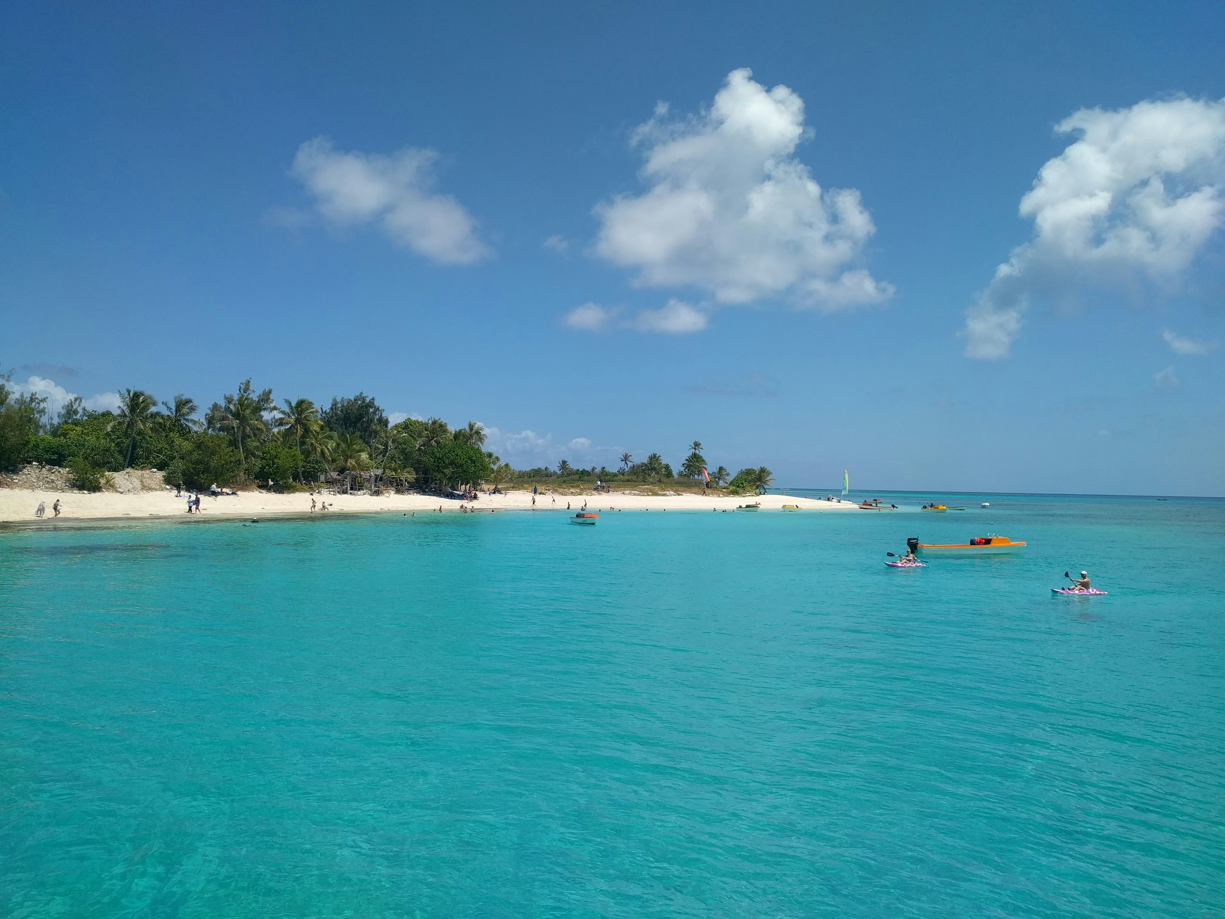 people on beach during daytime, Inyeug Island, also known as Mystery Island.