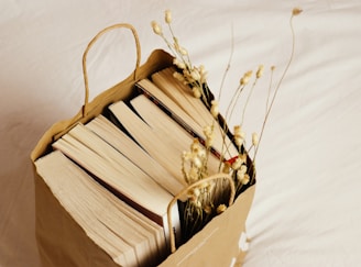 Mystery blind bags spilling open to reveal intriguing bookish surprises inside.