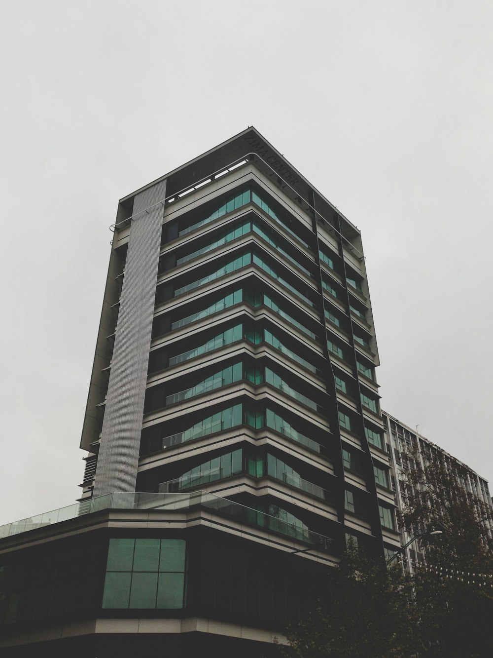 gray concrete building under white sky during daytime