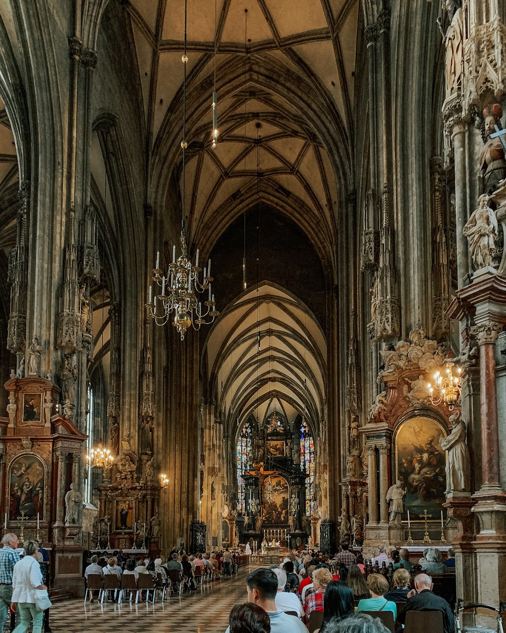 people inside cathedral during daytime