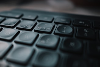 black computer keyboard in close up photography