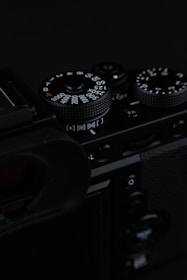 black and silver dslr camera