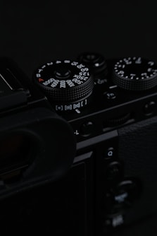 black and silver dslr camera