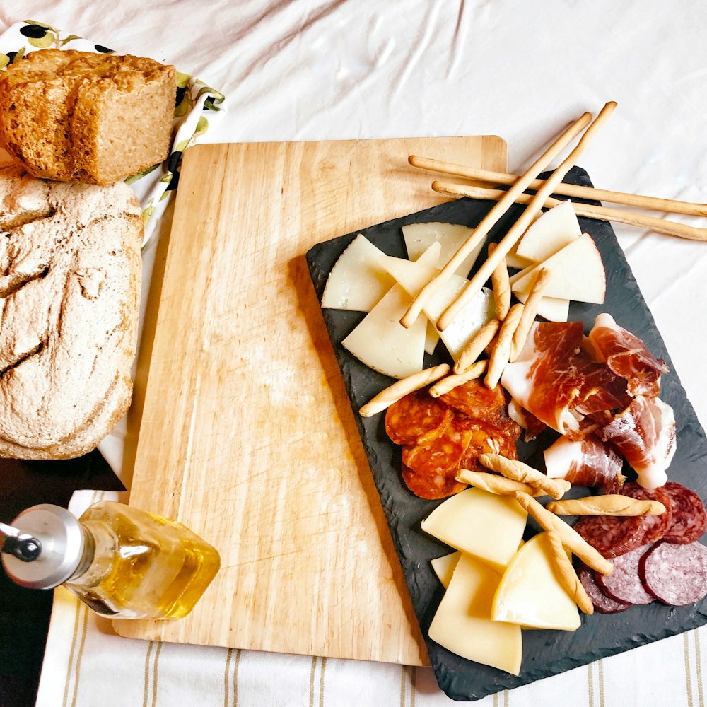 sliced bread on brown wooden chopping board