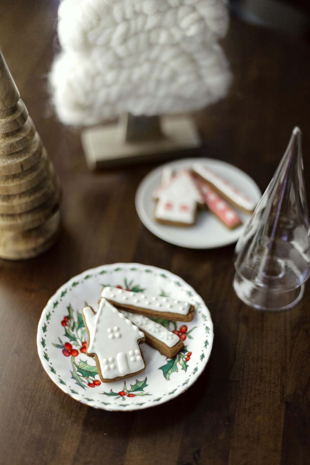 white and red floral ceramic plate with stainless steel fork and knife