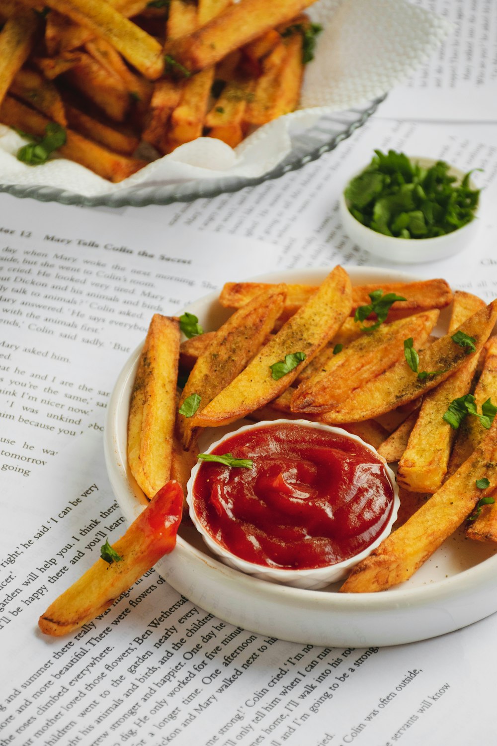 fries and red sauce on white ceramic plate