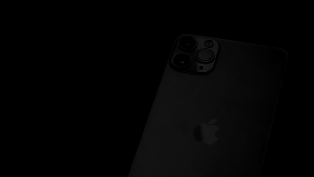 black iphone 7 on black surface