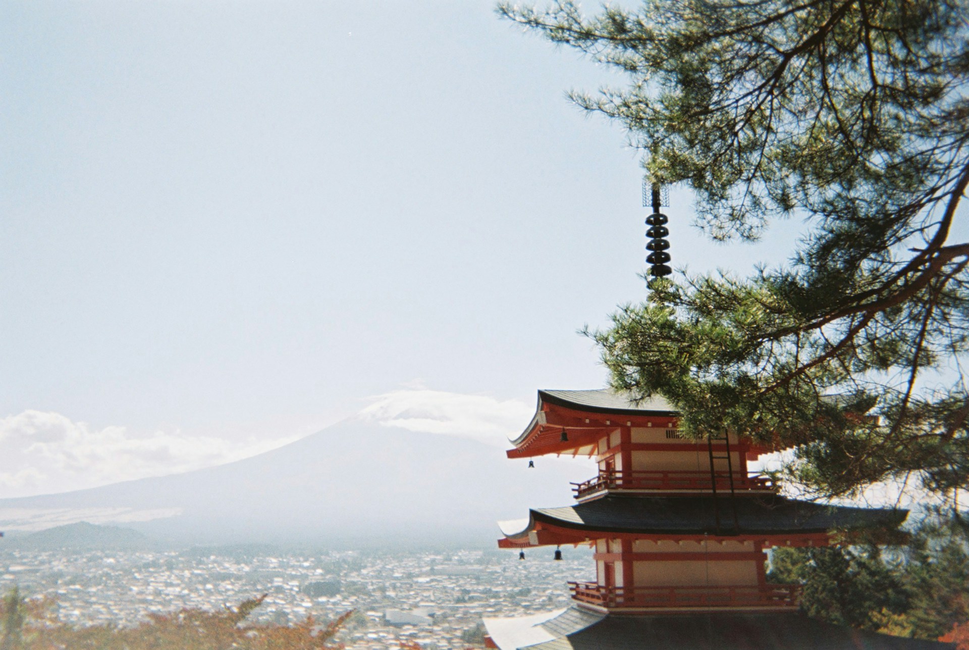 woman wearing yellow long-sleeved dress under white clouds and blue sky during daytime