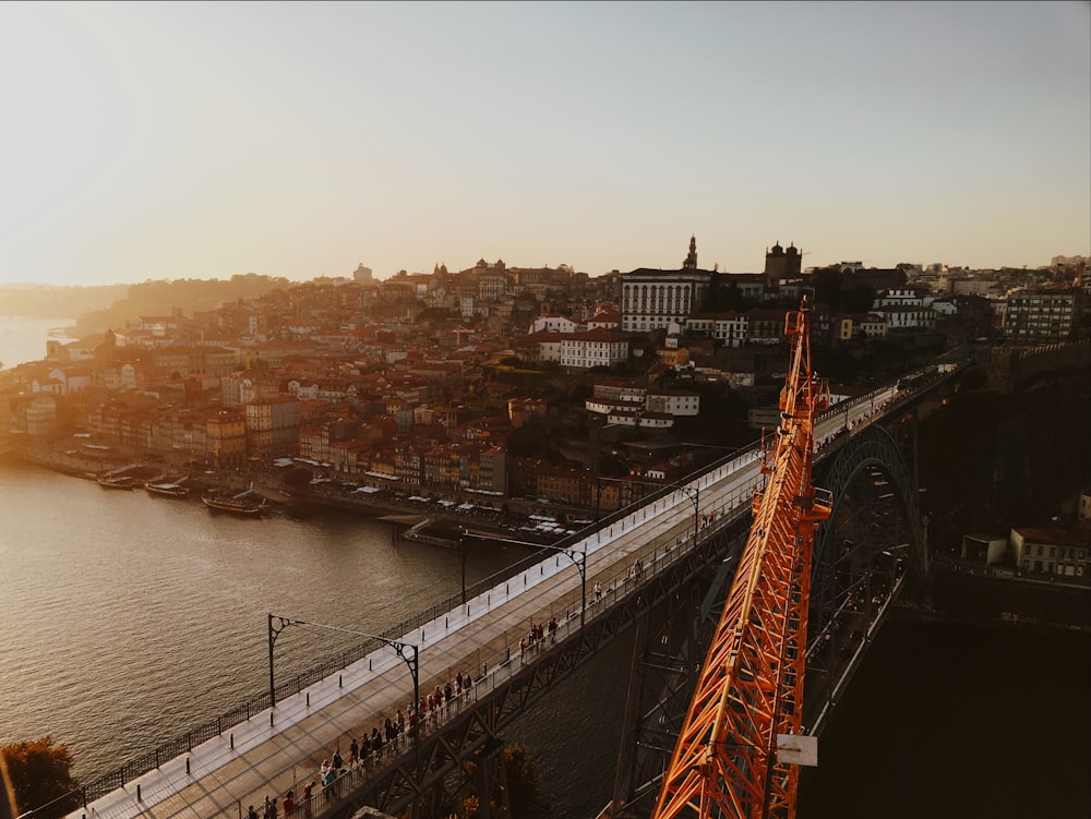 red metal bridge over river