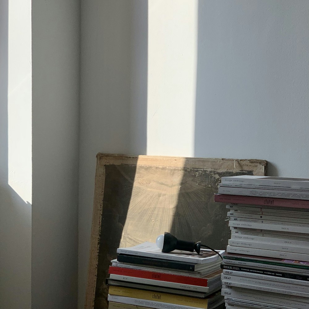 books on brown wooden table