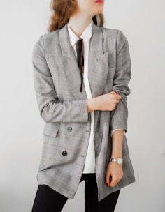 woman in gray blazer and black pants