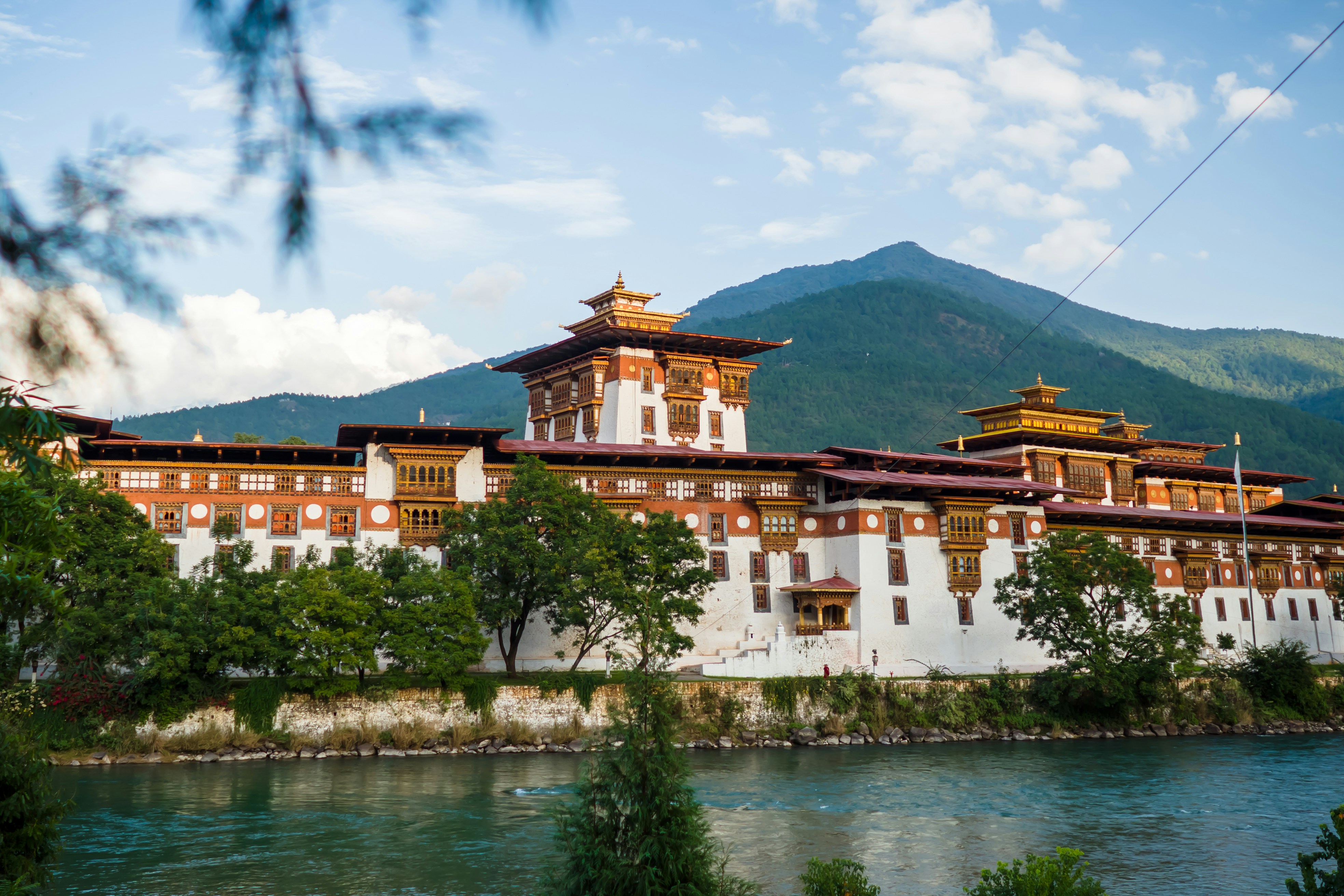 The Dzong Monastery in Bhutan Himalayas mountain. The Dzong Monastery in Bhutan Asia one of the largest monestary in Asiawith the landscape and mountains background, Bhutan