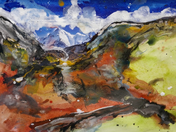 A vibrant landscape painting featuring snowy mountains under a cloudy blue sky. The foreground is filled with bold brushstrokes of earthy tones, depicting a dynamic terrain of rust, green, and gray. The merging of abstract elements with recognizable natural formations creates a striking and vivid composition.