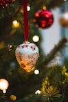 white and red baubles on christmas tree