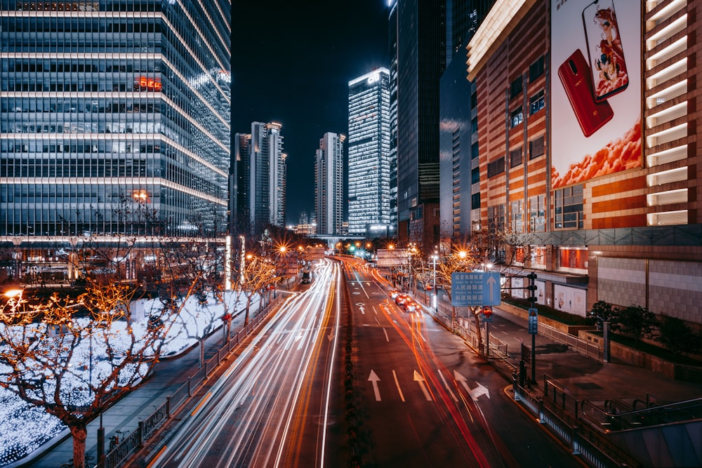 time lapse photography of city road during night time