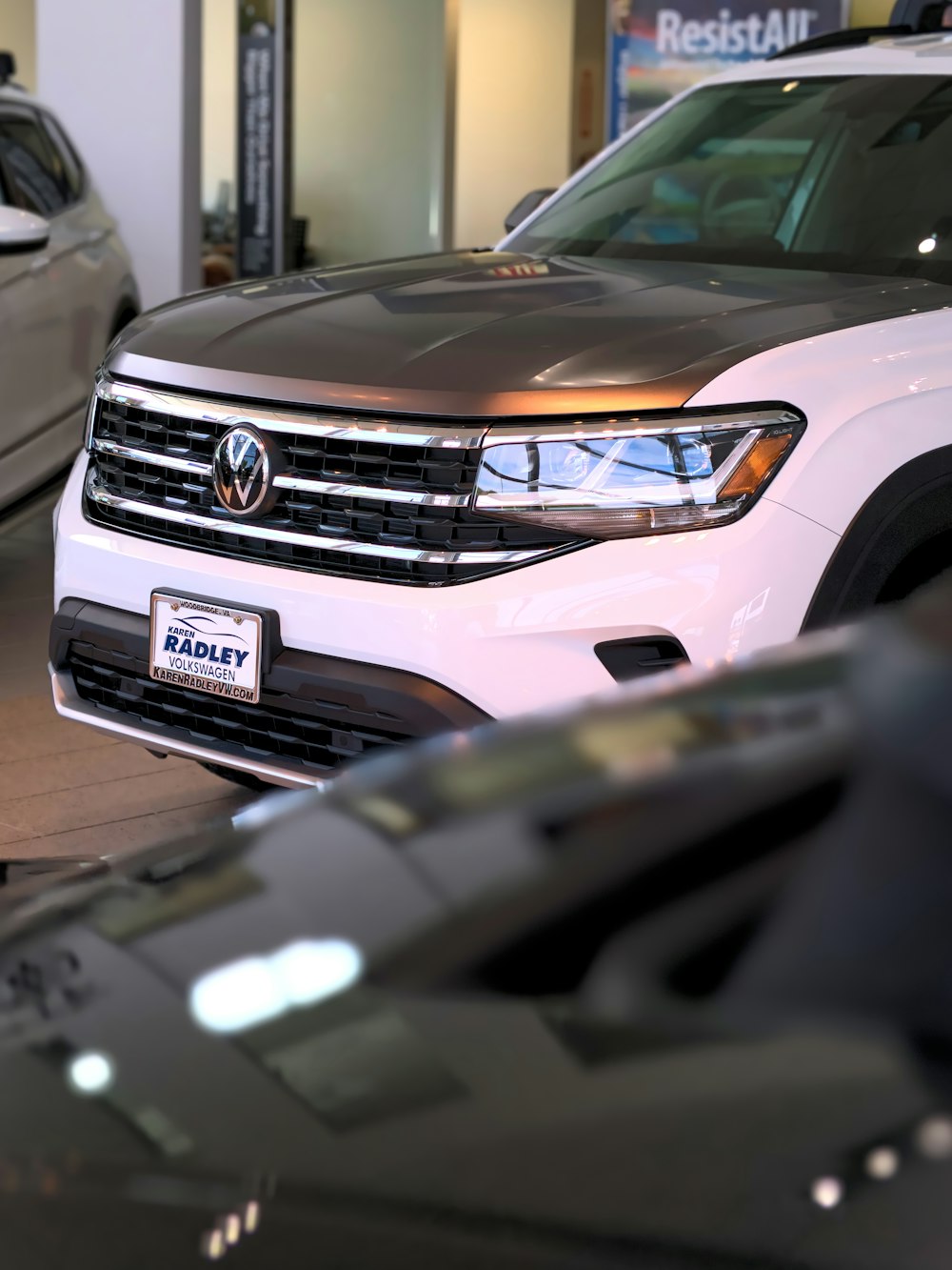 white ford car in front of black car