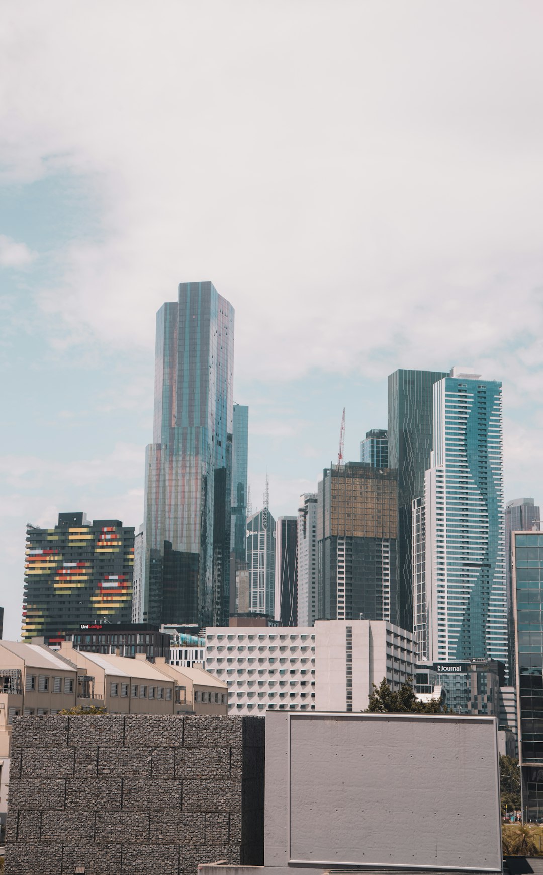 city buildings under white sky during daytime